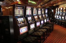 Mobile phone showing tg77 app casino and sports betting interface in Philippines